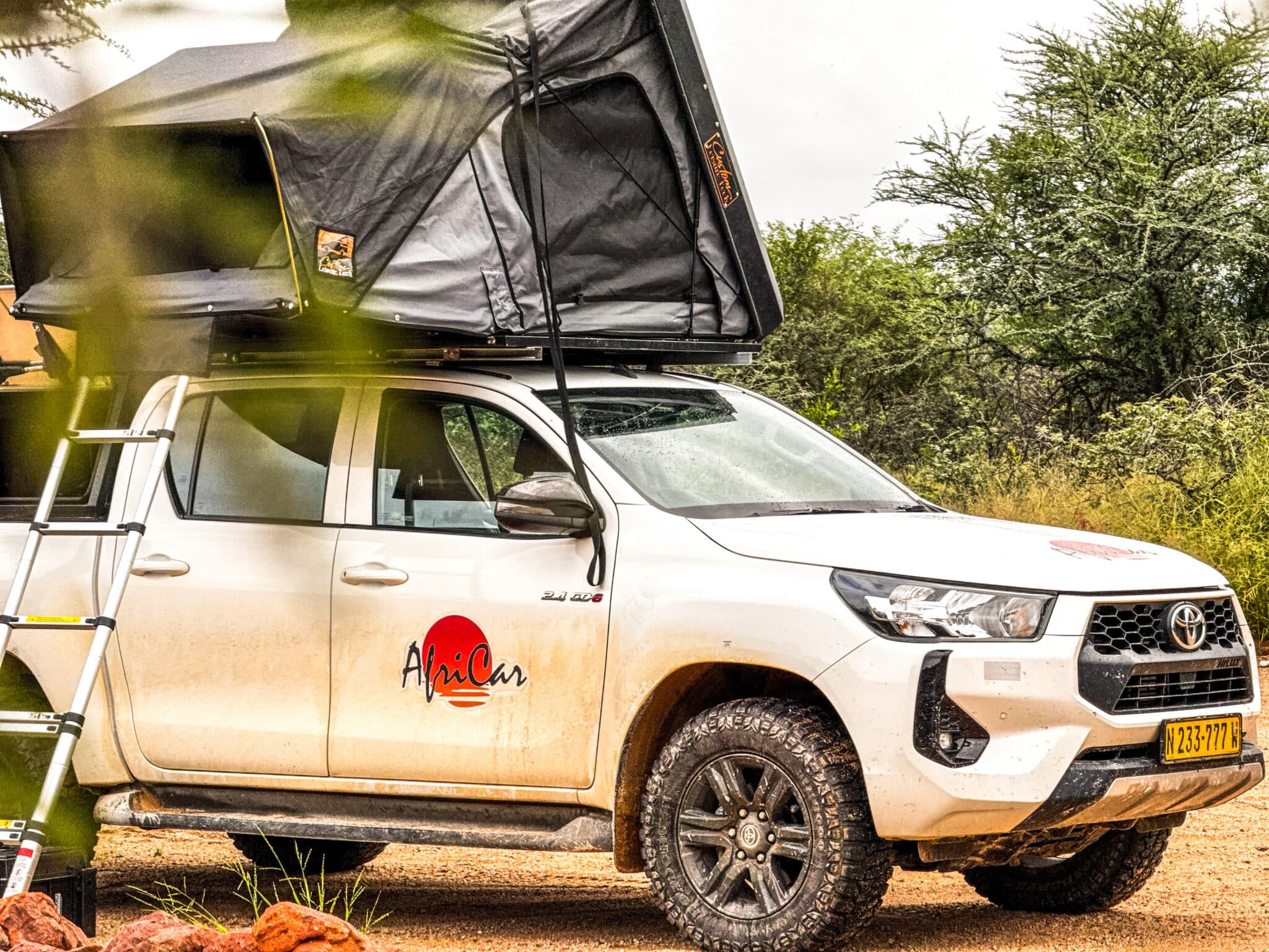 A 4x4 camping truck in a Namibia road trip campground.