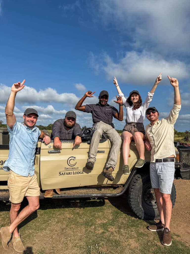 Liz and Leon from Mr and Mrs D Adventures with friends and safari guides in South Africa on safari.