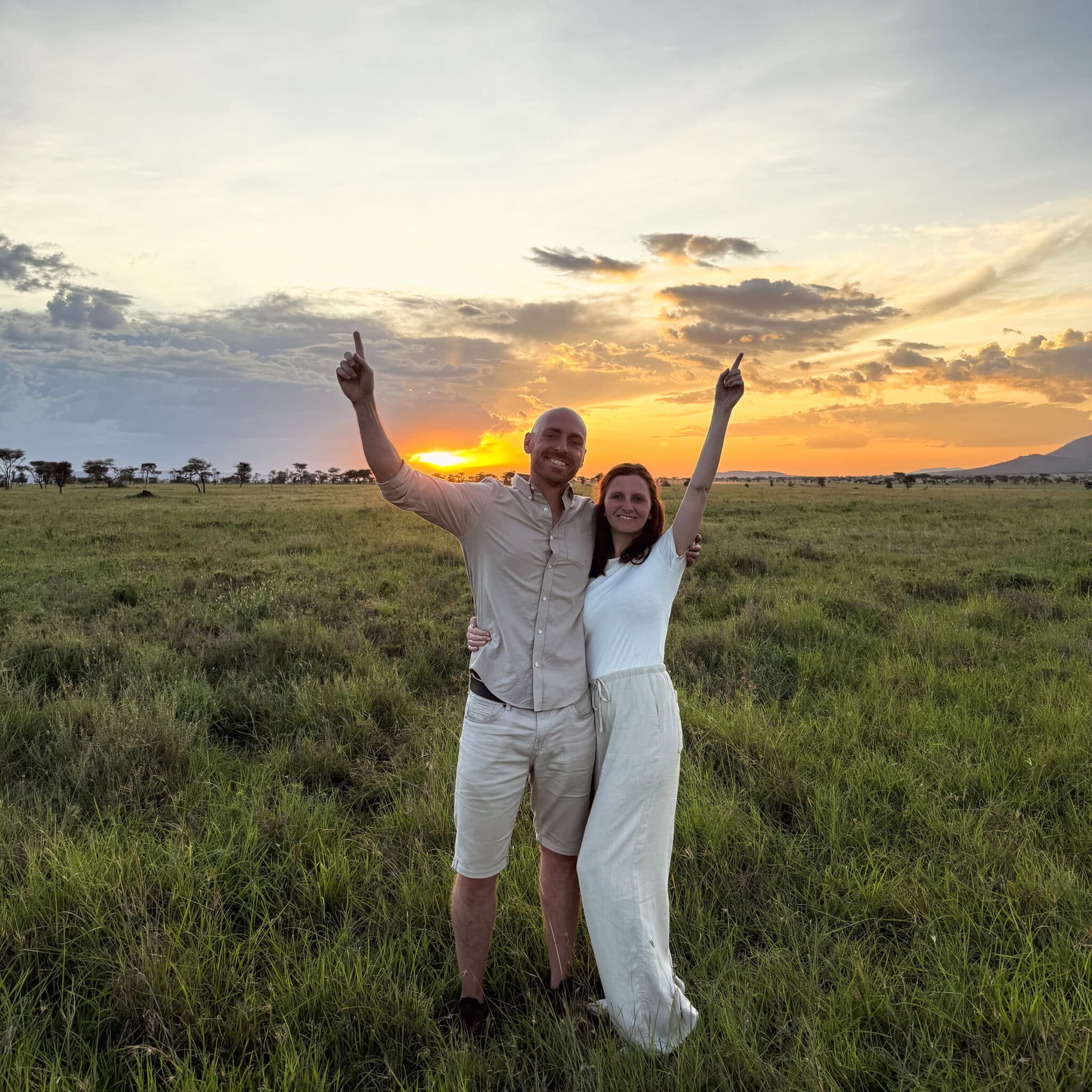 Liz & Leon in Tanzania with a sunset behind them
